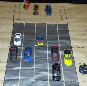 A disposable playmat with duct tape lanes is perfect to track the action